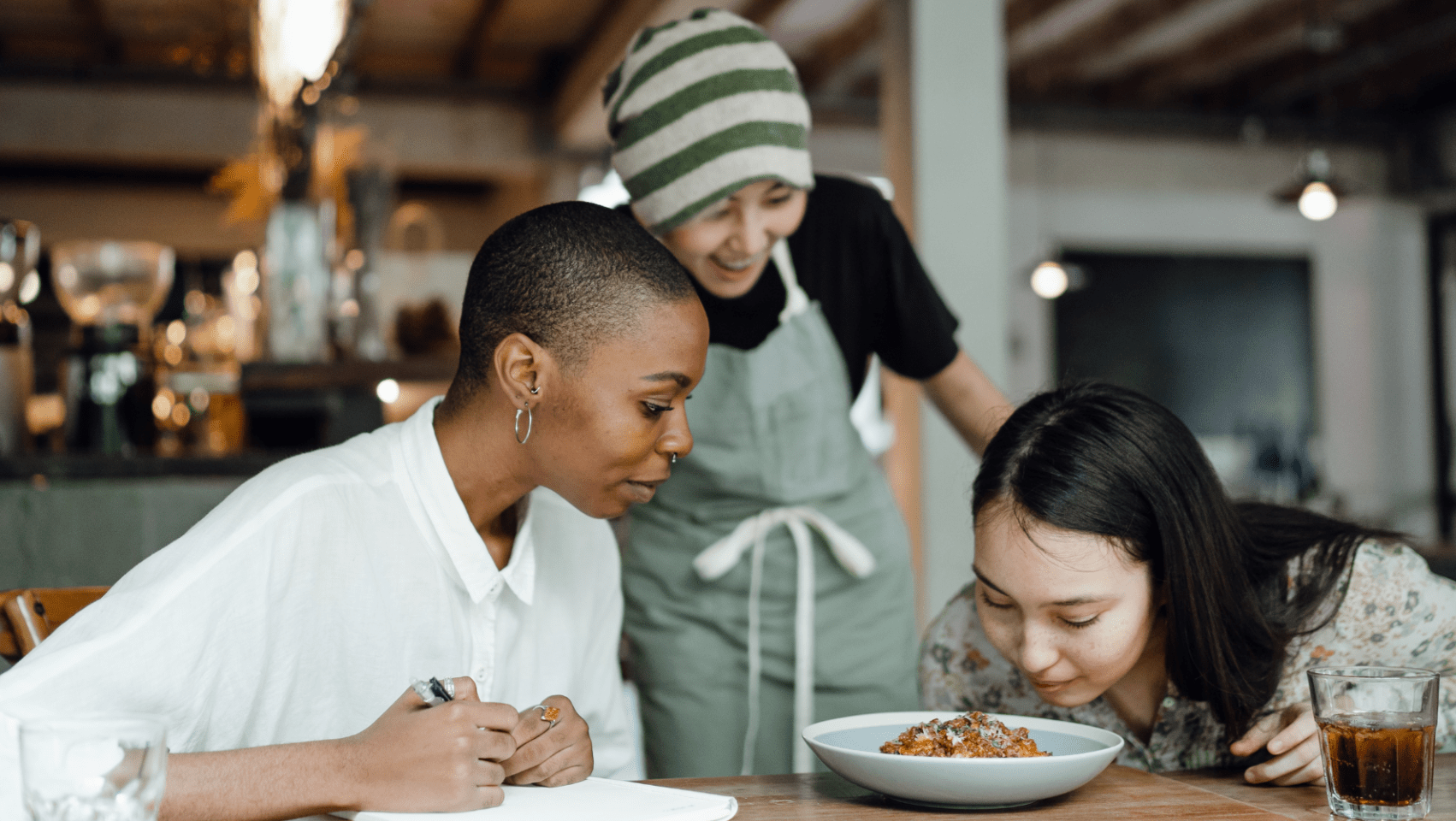 Students smelling food to understand nutritional value