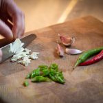 chopping herbs with a knife